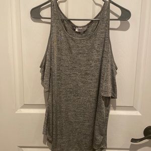 Jennifer Lopez open shoulder shirt